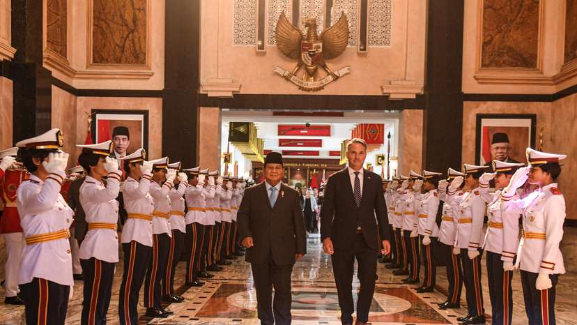 Indonesian Defence Minister Prabowo Subianto walks with Australian Defence Minister Richard Marles after their meeting in Jakarta
