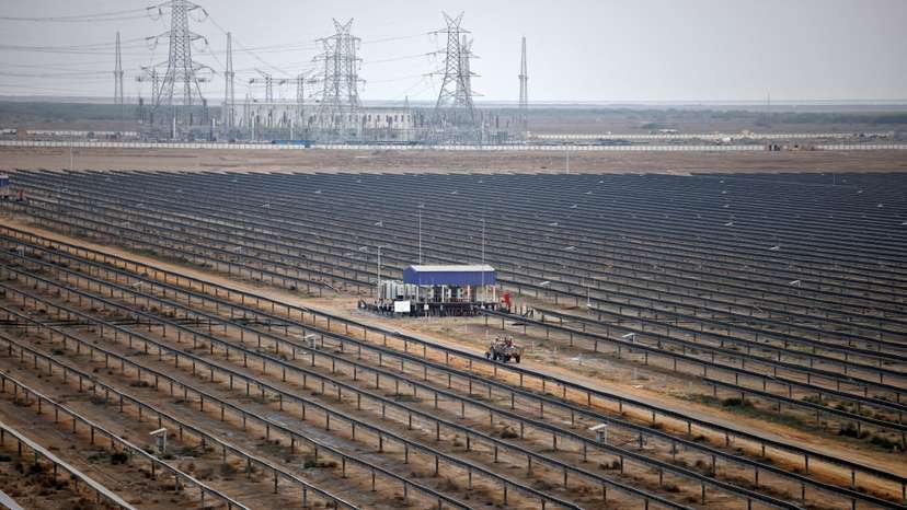 FILE PHOTO: A general view of installed solar panels at the Khavda Renewable Energy Park of Adani Green Energy Ltd (AGEL), in Khavda