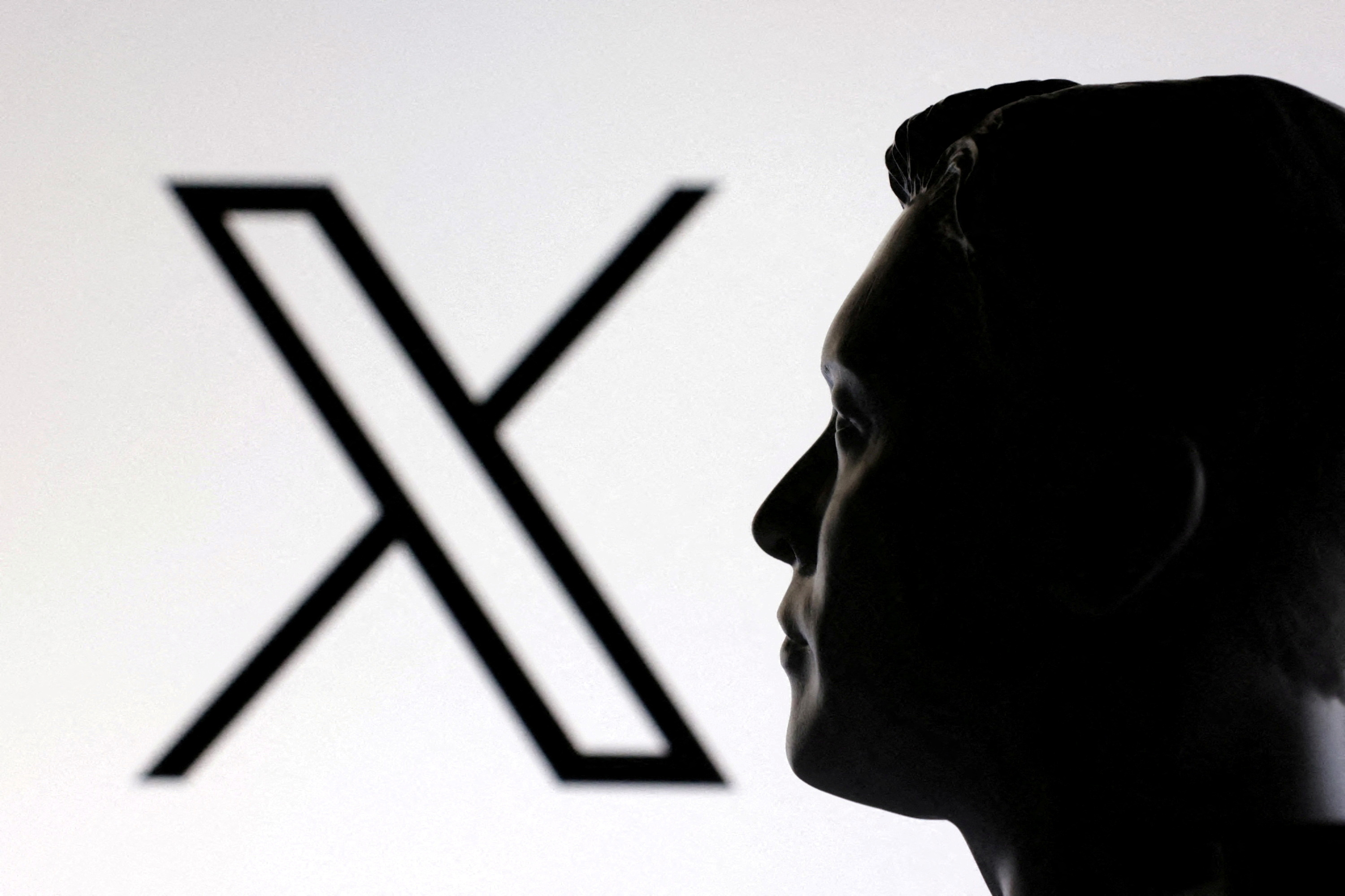 FILE PHOTO: Illustration shows 3D-printed miniature model of Elon Musk and X logo