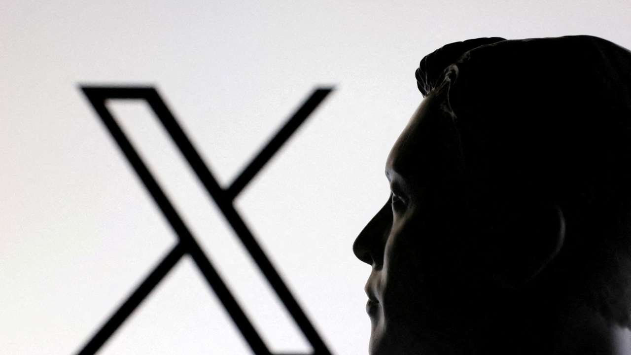 FILE PHOTO: Illustration shows 3D-printed miniature model of Elon Musk and X logo