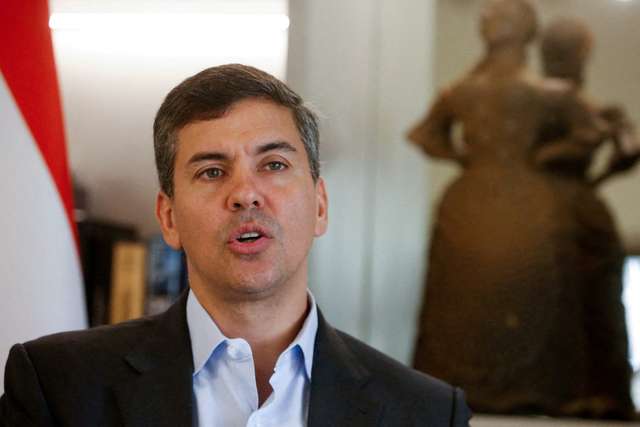 FILE PHOTO: Paraguay's President Pena speaks during an interview with Reuters, in Asuncion