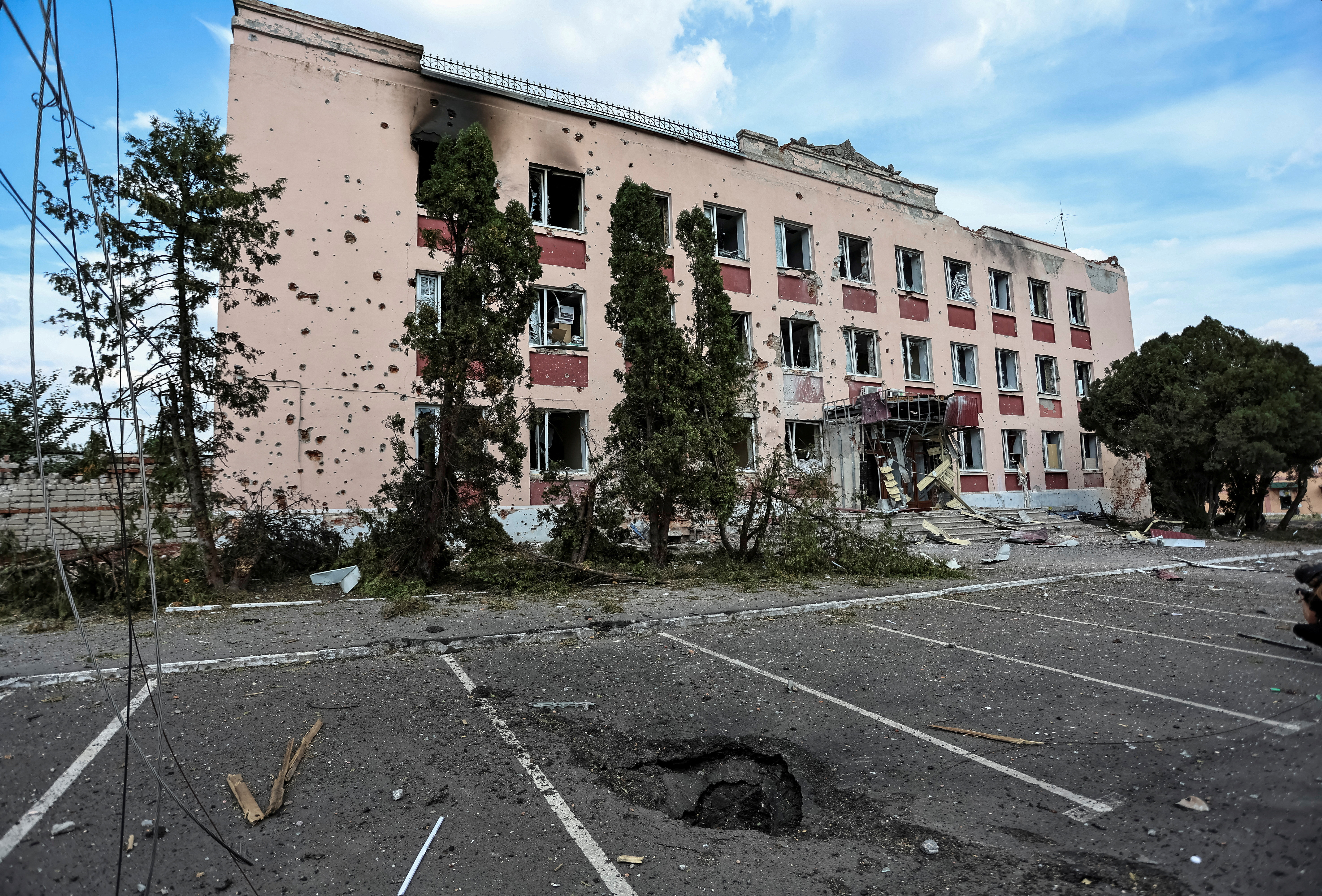 FILE PHOTO: A view shows a building damaged during recent fighting between Ukrainian and Russian forces in the town of Sudzha