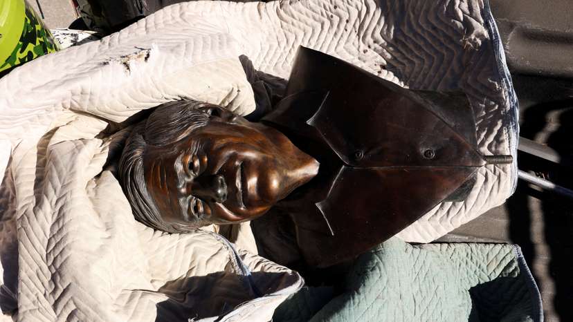 A bust of United Farm Workers union co-founder Cesar Chavez sits in the back of a Denver Parks and Recreation pickup truck following its removal from Cesar Chavez Park