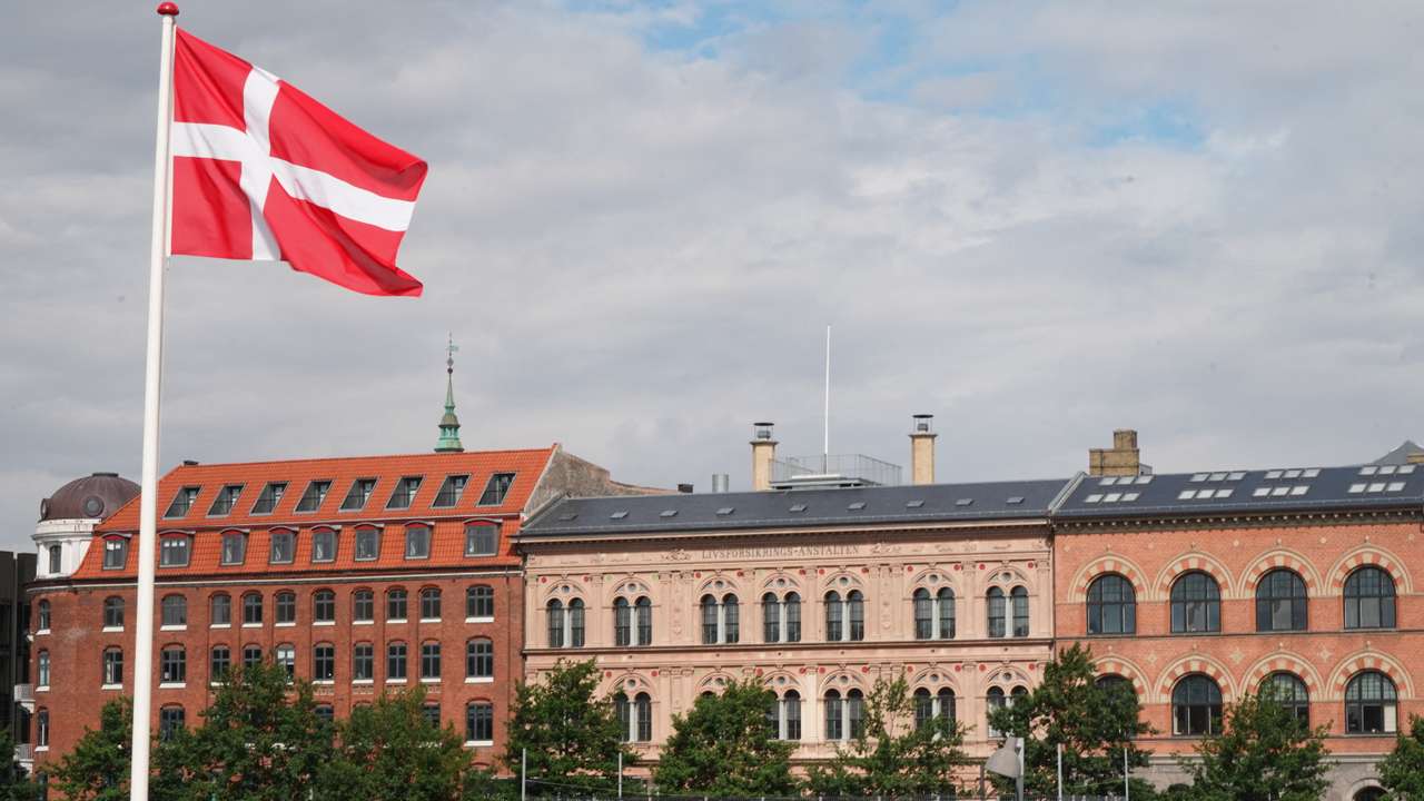 A Danish flag flies outside the foreign ministry in Copenhagen