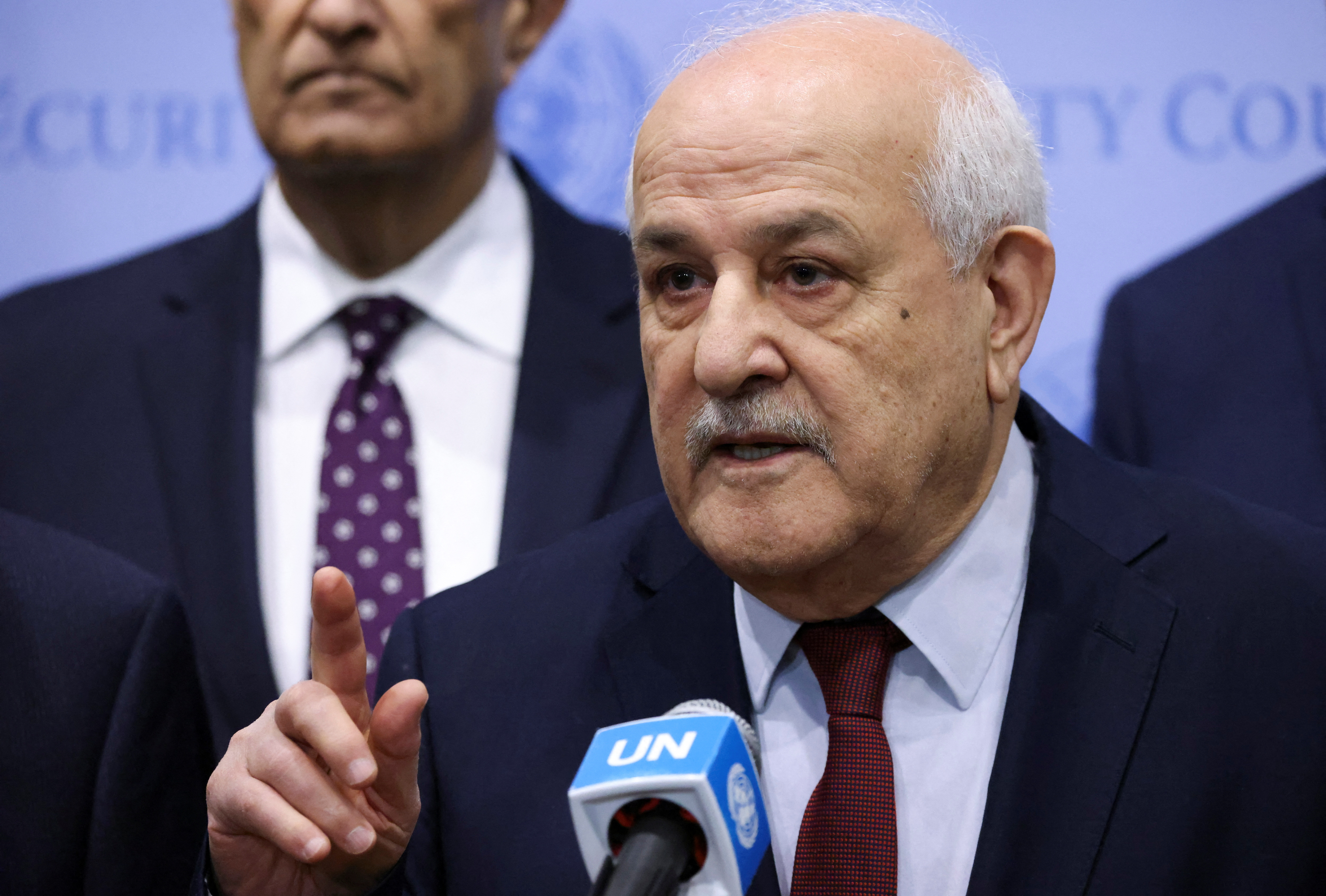 Members of the United Nations Security Council vote on a Gaza resolution that demands an immediate ceasefire, in New York