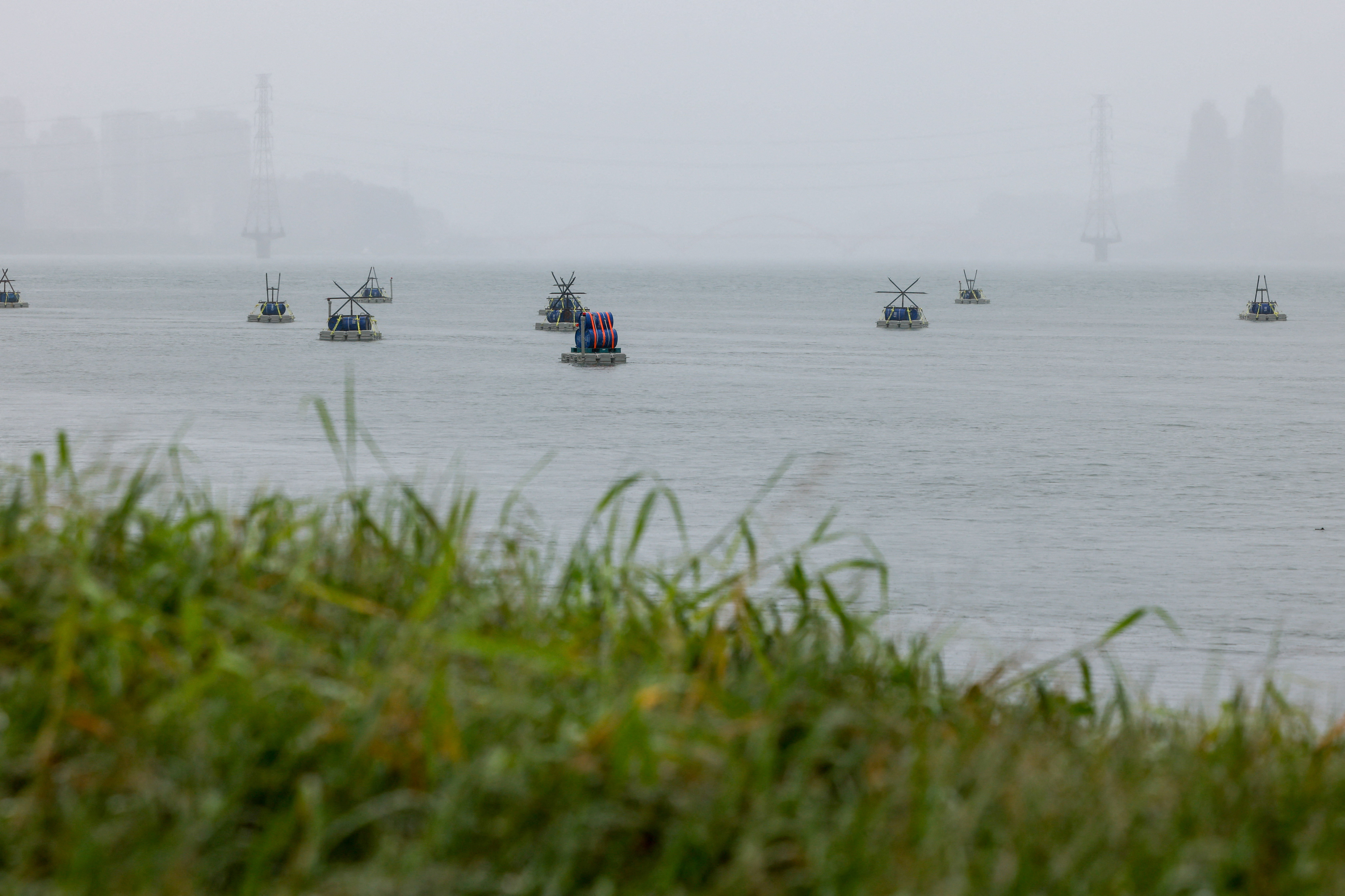 Explosive barrels placed by Taiwan military at the Tamsui River as part of a  series of emergency combat readiness drills in Taipei