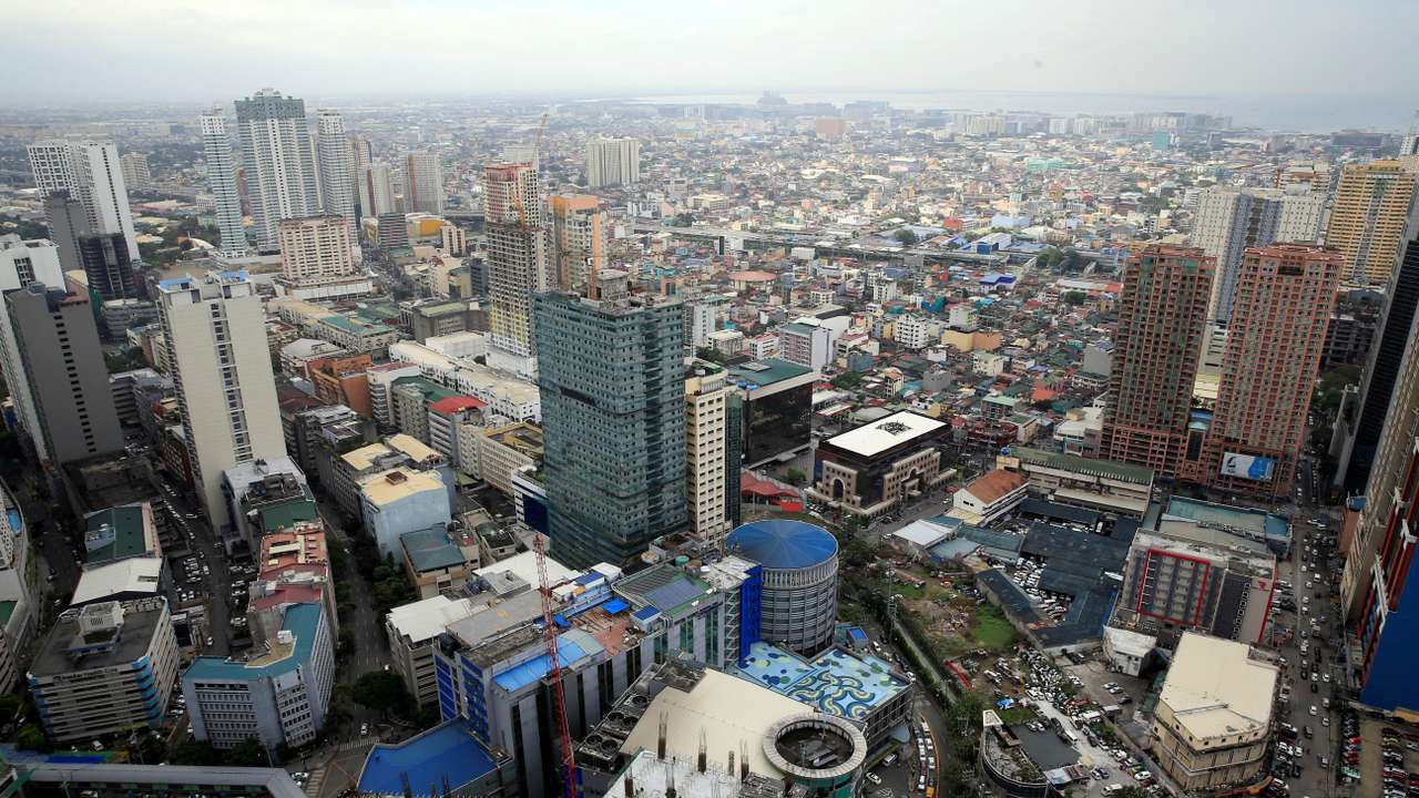Construction of new buildings alongside older establishments is seen within the business district in Makati City, metro Manila