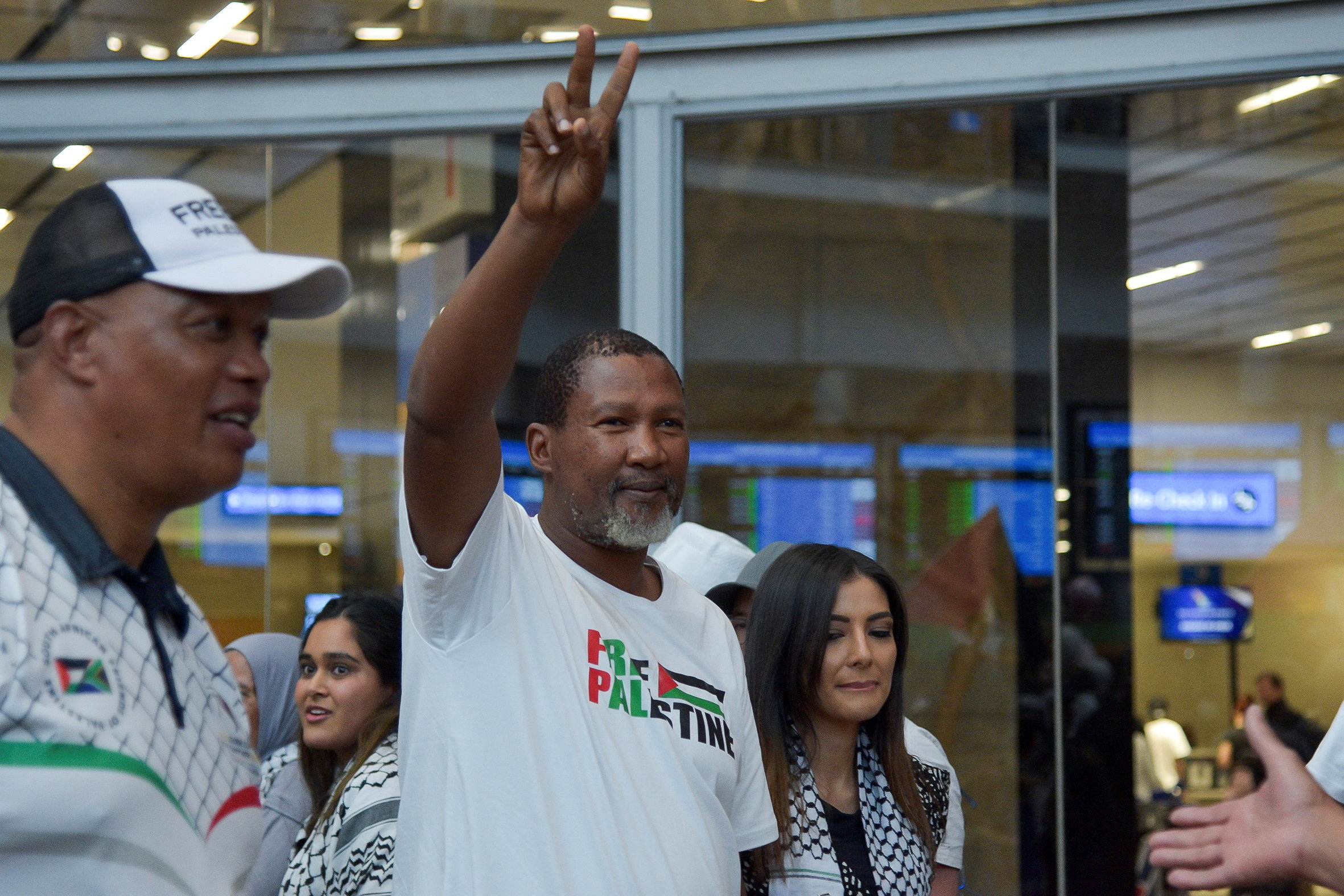 South African activists who were detained in Israel arrive home