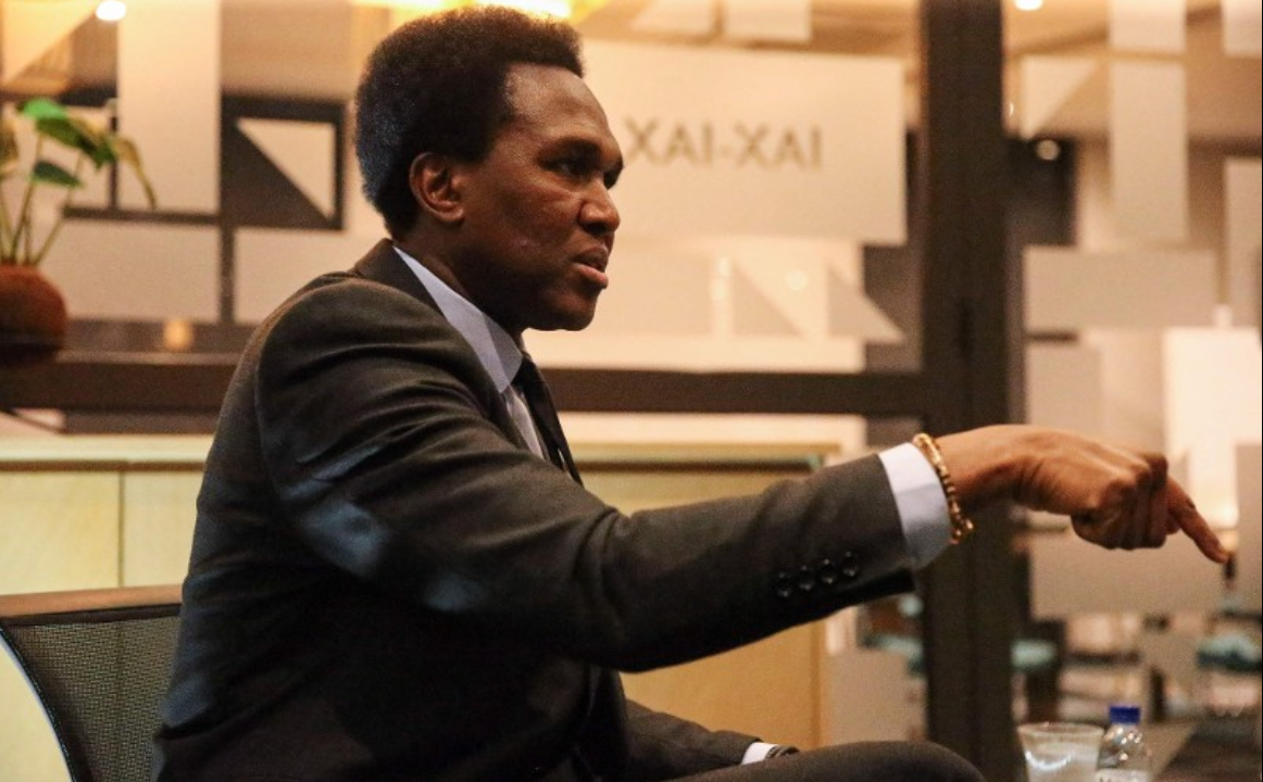 Mozambique's main opposition leader Venancio Mondlane gestures as he sits for an interview with AFP in Maputo