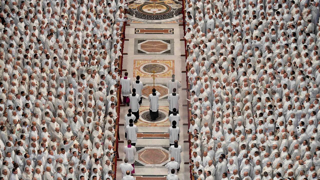 Archbishop Rino Fisichella presides over Sunday's mass instead of Pope Francis