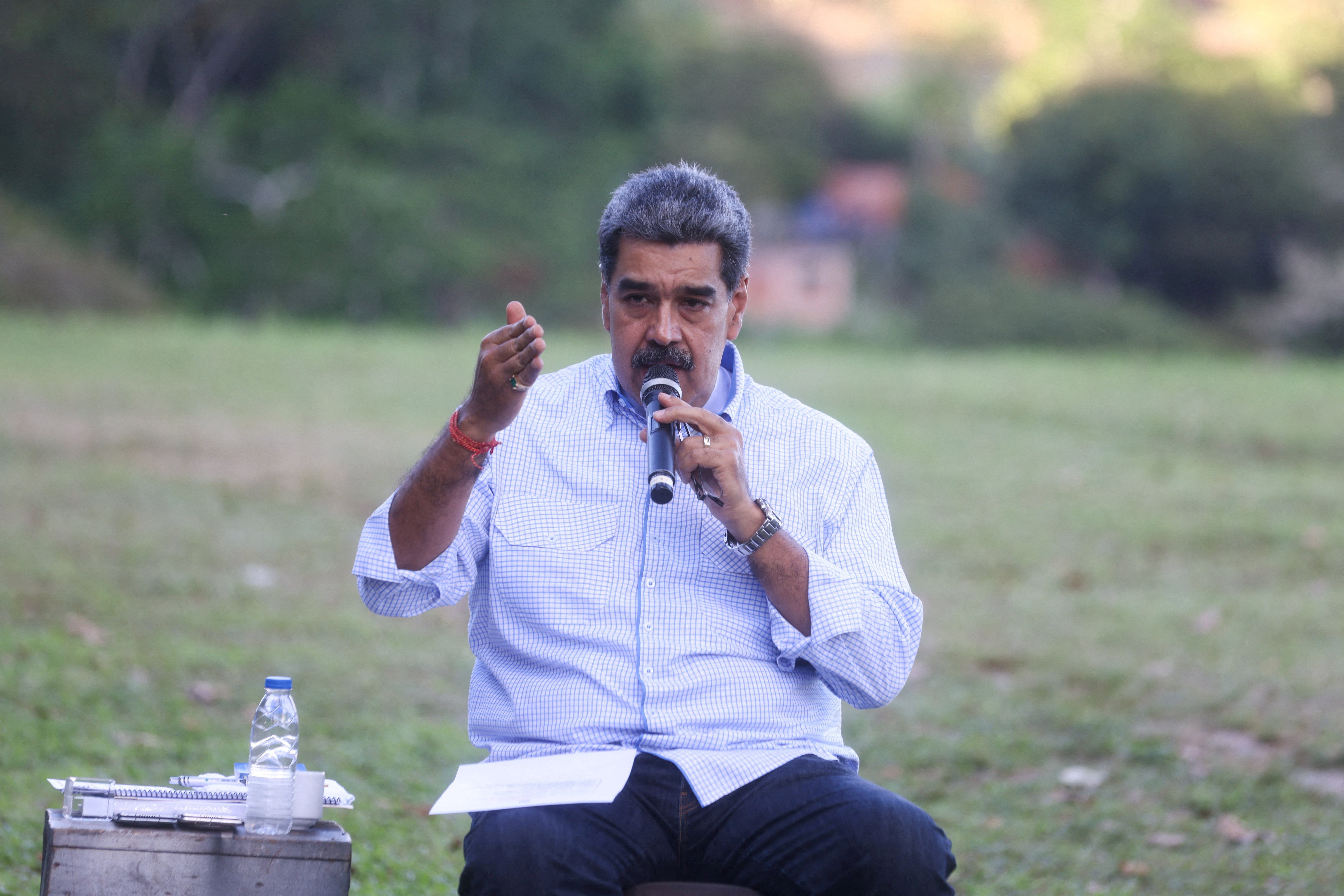 FILE PHOTO: Venezuelan President Maduro speaks during an event at the Parque Caiza socialist commune, amid rising tensions with the United States, in Caracas