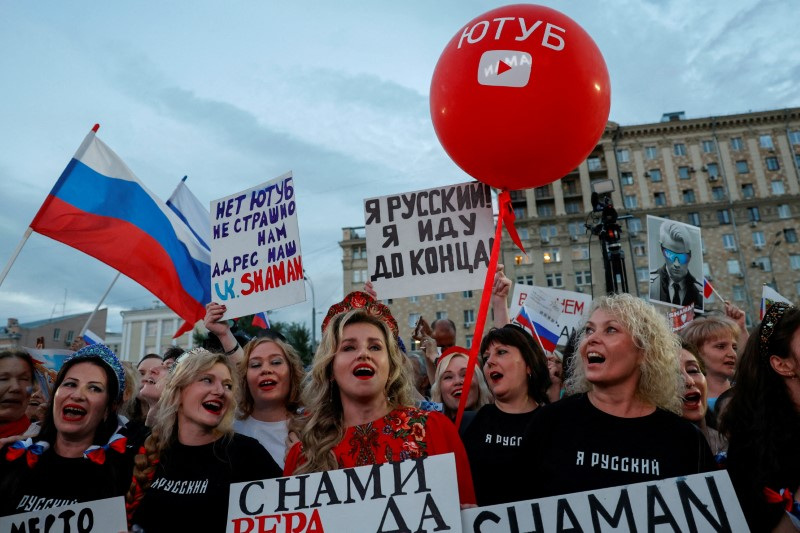 FILE PHOTO: Spectators gather before a concert held in protest against blocking of Russian users' channels on YouTube, in Moscow